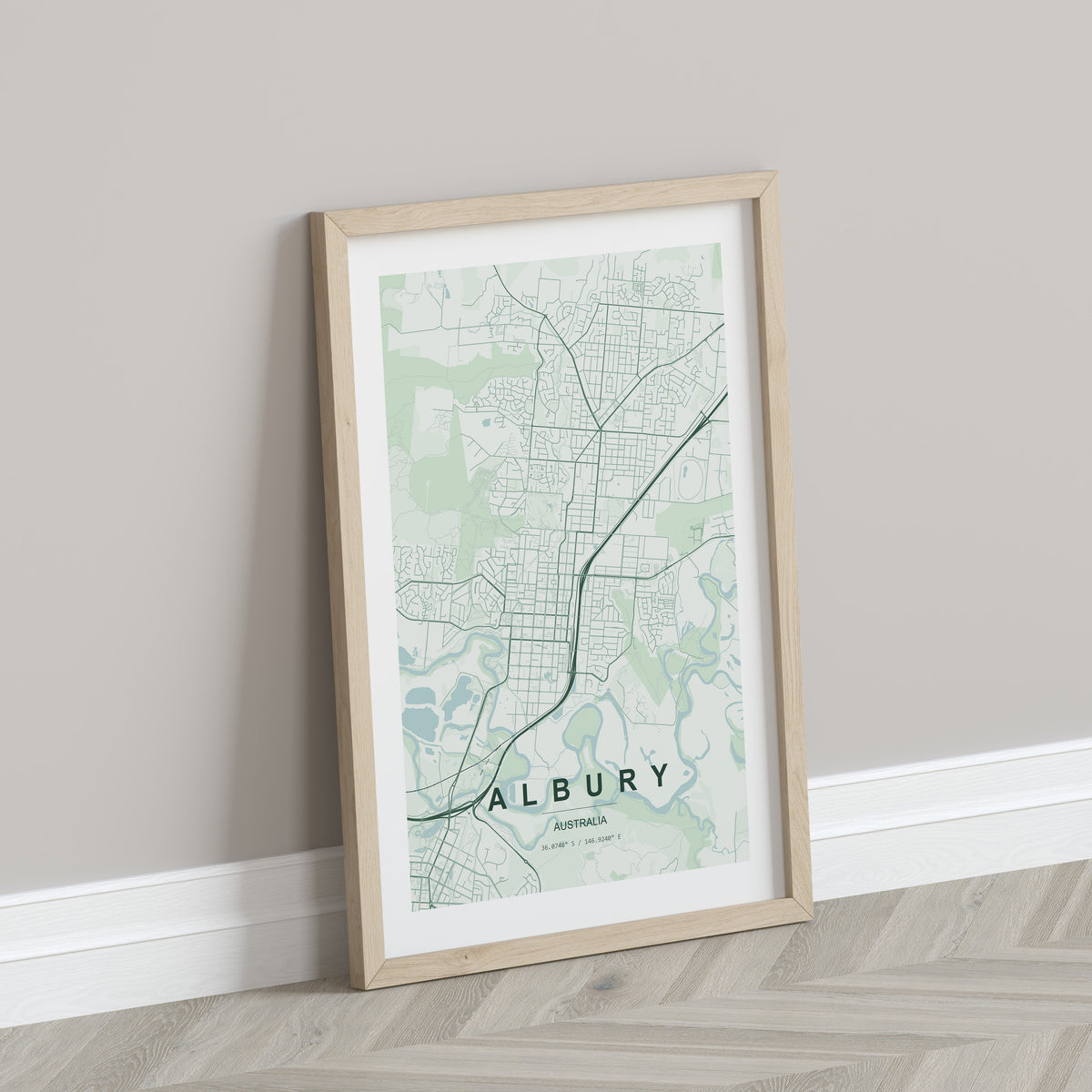 Albury, New South Wales, Australia map print in the Forest theme in a light wooden frame leaning against a pale wall