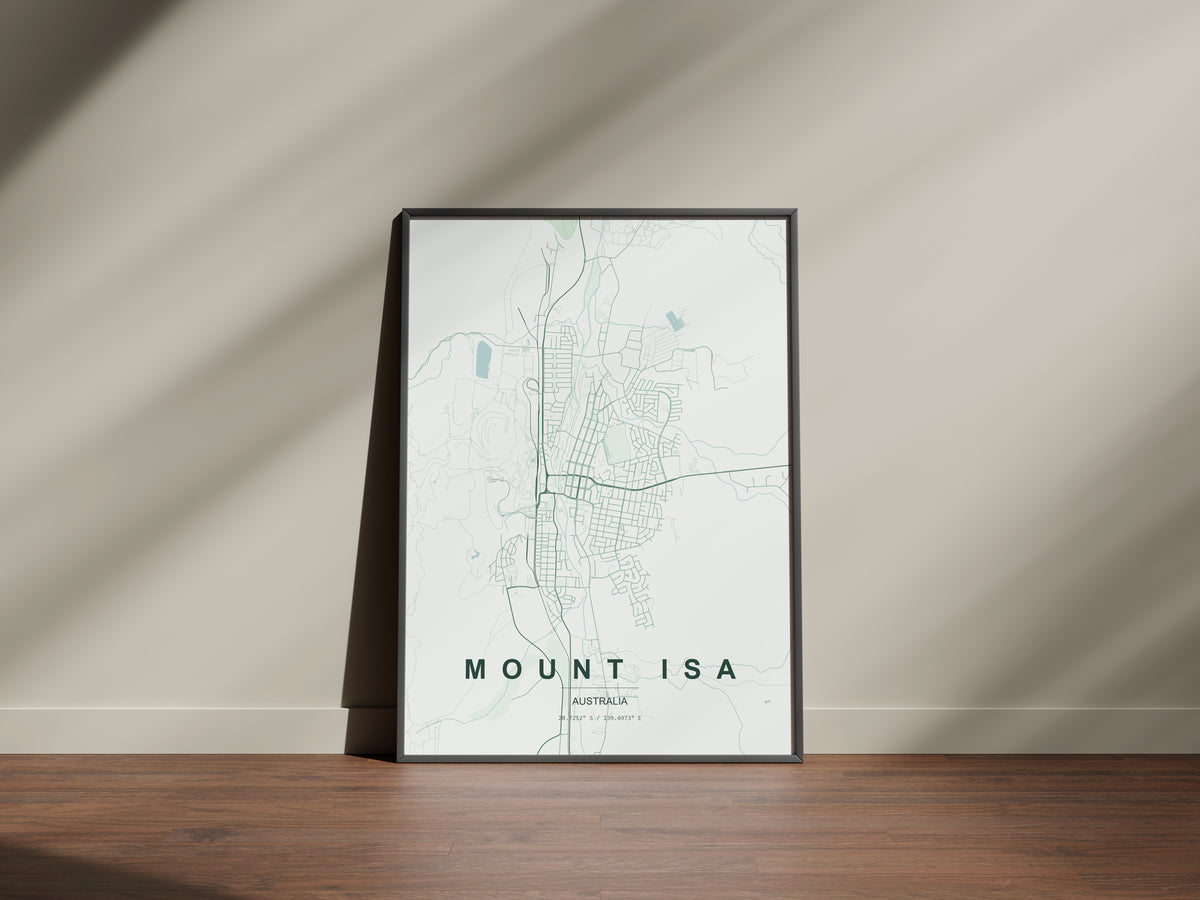 Mount Isa, Queensland, Australia map print in the Forest theme in a black frame on a wooden surface against a pale wall