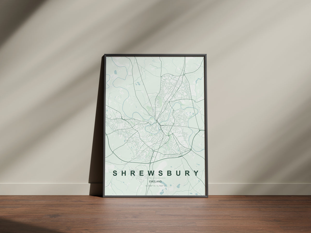 Shrewsbury, England, United Kingdom map print in the Forest theme in a black frame on a wooden surface against a pale wall