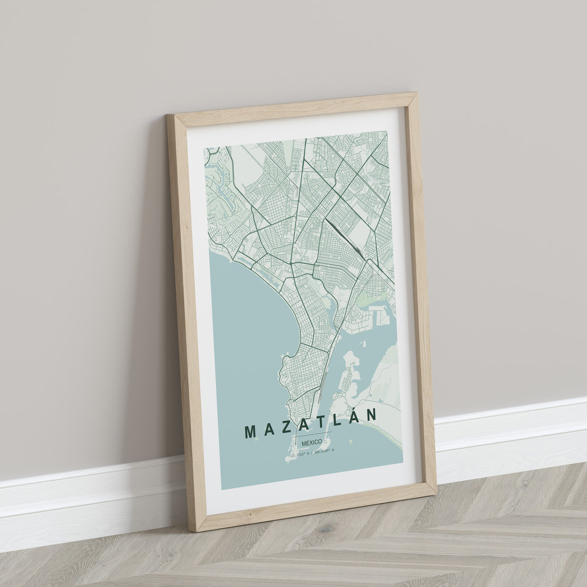Mazatlán, Mexico map print in the Forest theme in a light wooden frame leaning against a pale wall