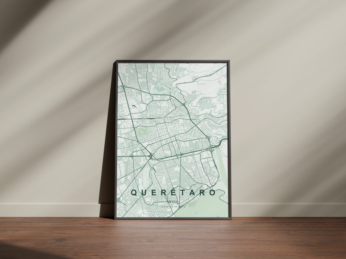 Querétaro, Mexico map print in the Forest theme in a black frame on a wooden surface against a pale wall