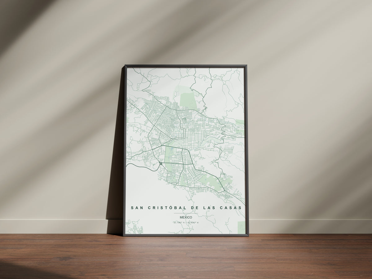 San Cristóbal de las Casas, Mexico map print in the Forest theme in a black frame on a wooden surface against a pale wall