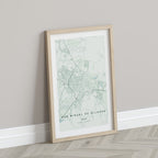 San Miguel de Allende, Mexico map print in the Forest theme in a light wooden frame leaning against a pale wall
