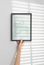 San Miguel de Allende, Mexico map print in the Forest theme in a black frame held against a pale wall