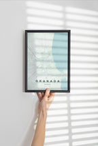 Granada, Nicaragua map print in the Forest theme in a black frame held against a pale wall