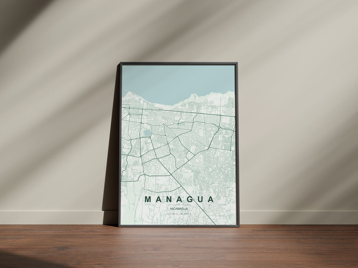 Managua, Nicaragua map print in the Forest theme in a black frame on a wooden surface against a pale wall