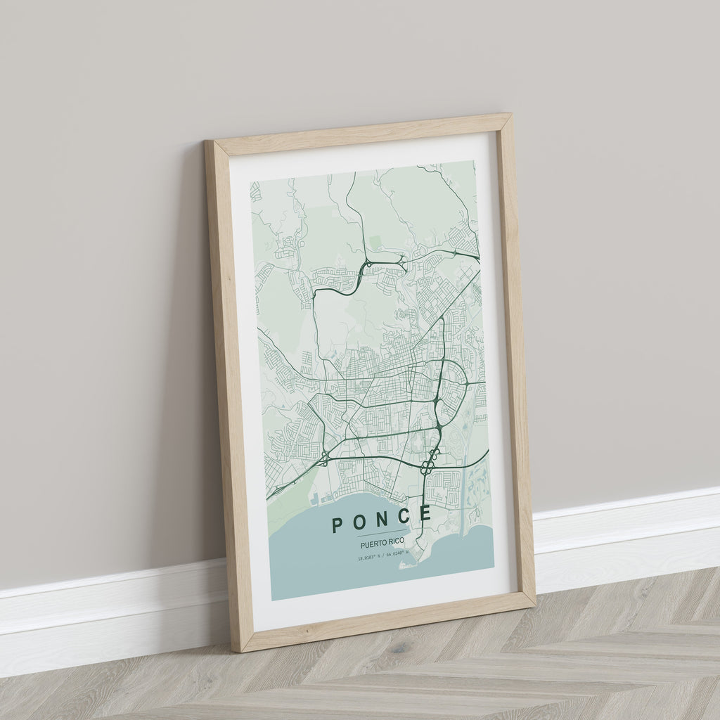 Ponce, Puerto Rico, United States map print in the Forest theme in a light wooden frame leaning against a pale wall