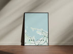 San Juan, Puerto Rico, United States map print in the Forest theme in a black frame on a wooden surface against a pale wall