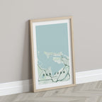 San Juan, Puerto Rico, United States map print in the Forest theme in a light wooden frame leaning against a pale wall