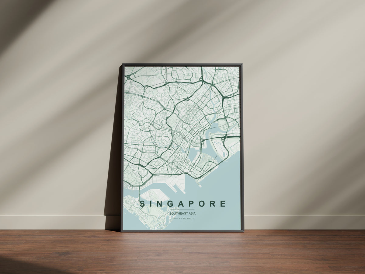 Singapore,  map print in the Forest theme in a black frame on a wooden surface against a pale wall