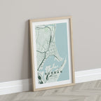 Durban, KwaZulu-Natal, South Africa map print in the Forest theme in a light wooden frame leaning against a pale wall