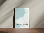 Paternoster, Western Cape, South Africa map print in the Forest theme in a black frame on a wooden surface against a pale wall