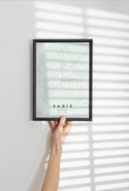 Sabie, Mpumalanga, South Africa map print in the Forest theme in a black frame held against a pale wall