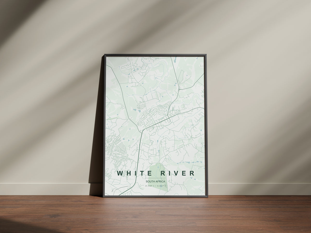 White River, Mpumalanga, South Africa map print in the Forest theme in a black frame on a wooden surface against a pale wall