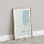 Hilo, Hawaii, United States map print in the Forest theme in a light wooden frame leaning against a pale wall